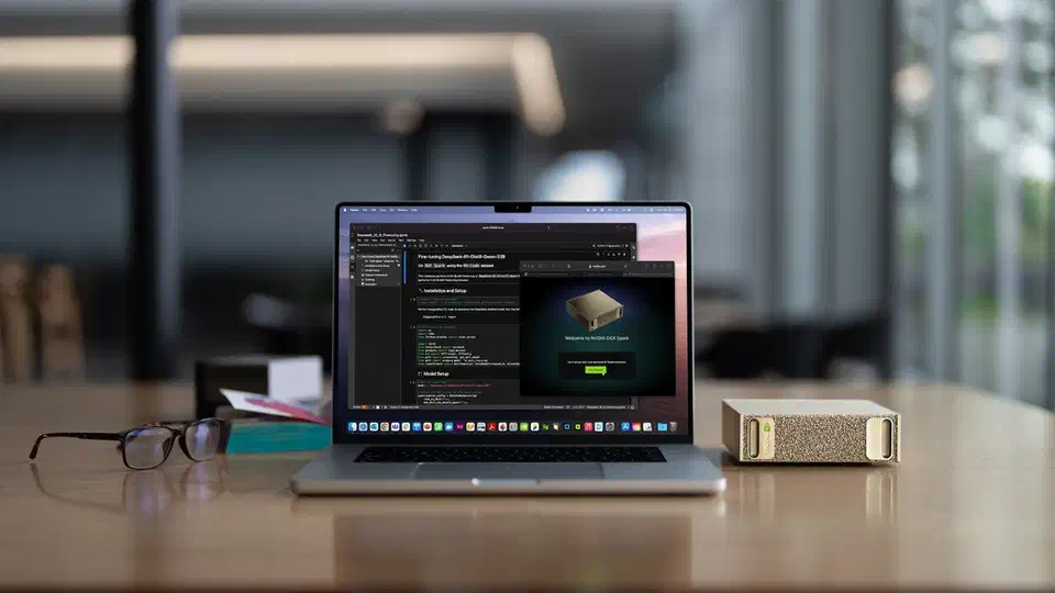 NVIDIA DGX Spark desktop AI supercomputer alongside a laptop for scale