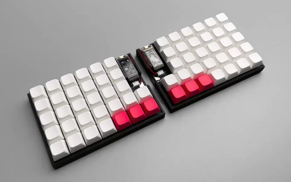 Close-up detail of a Kailh Choc v2 switch showing the hybrid MX-compatible upper housing on a Choc footprint