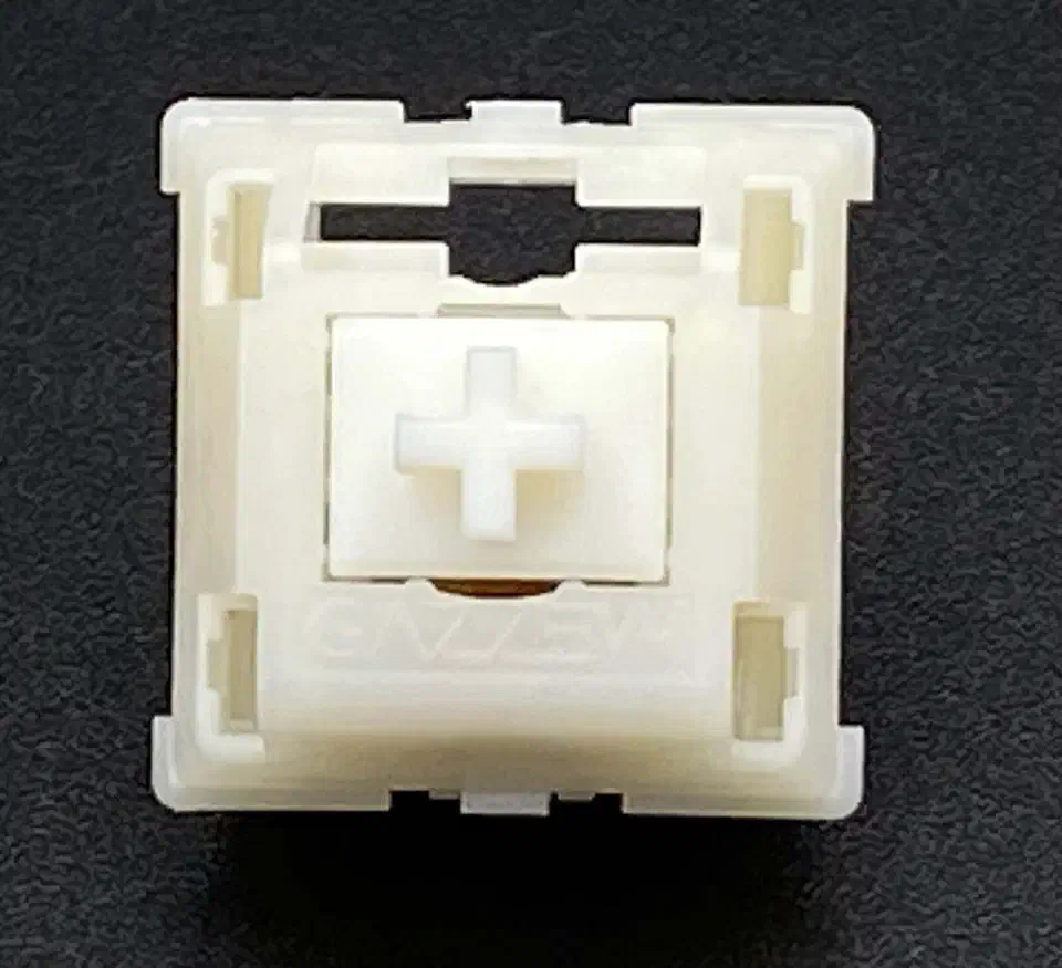 Gazzew Boba U4 silent tactile switches with distinctive translucent milky white housing