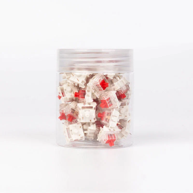 Gateron Silent Red switch with transparent top housing and milky base showing the silicone-dampened stem