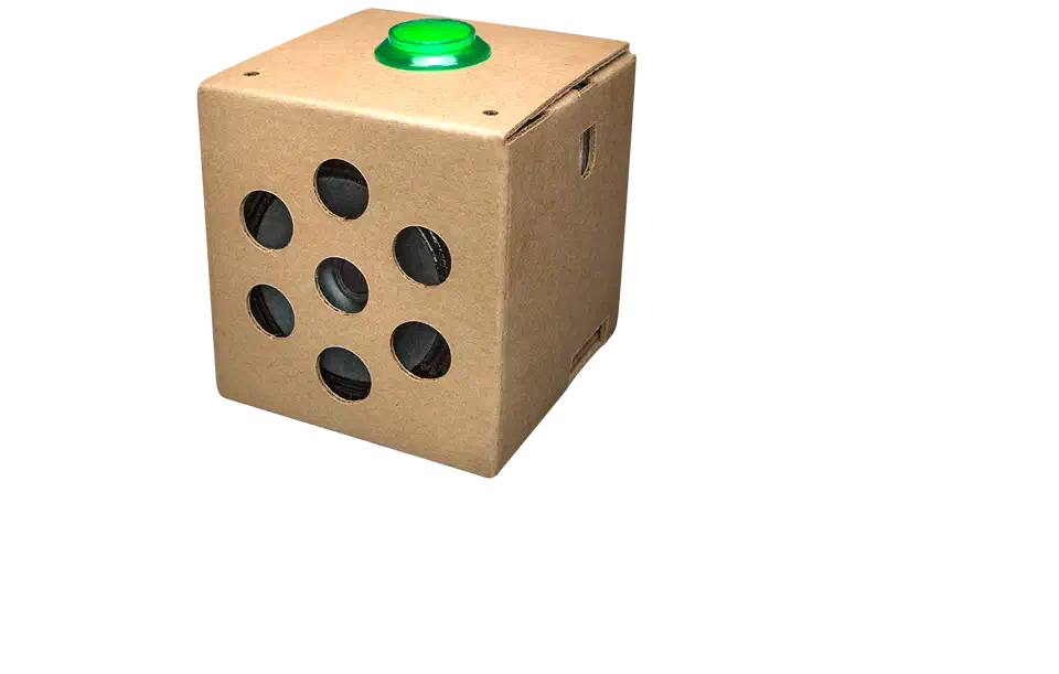 Google AIY Voice Kit fully assembled in its cardboard enclosure with button and speaker