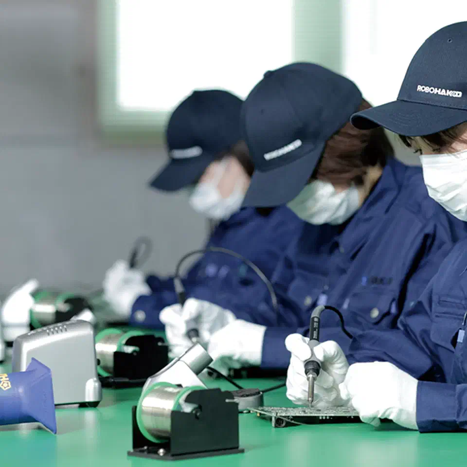 Hakko FX-888DX digital soldering station with handpiece resting in holder