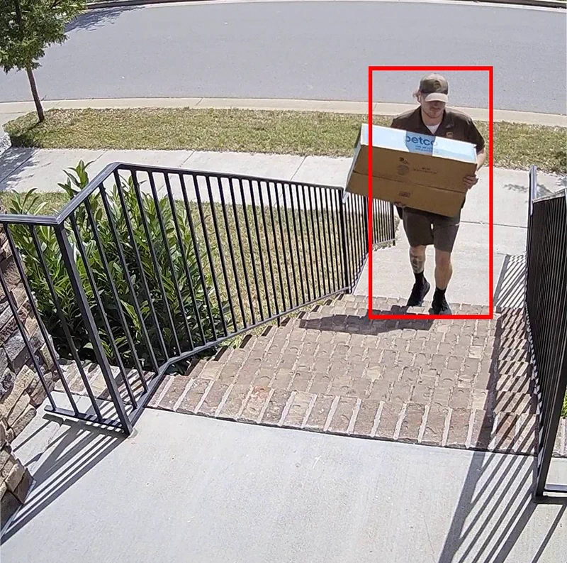 Frigate detection demo showing phone and tablet views with person detection bounding boxes on security camera footage
