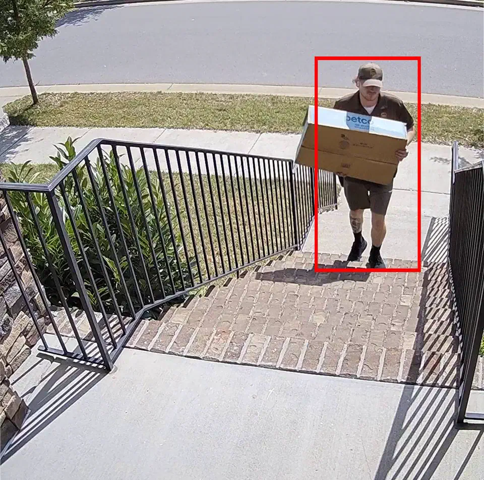Frigate detection demo showing phone and tablet views with person detection bounding boxes on security camera footage