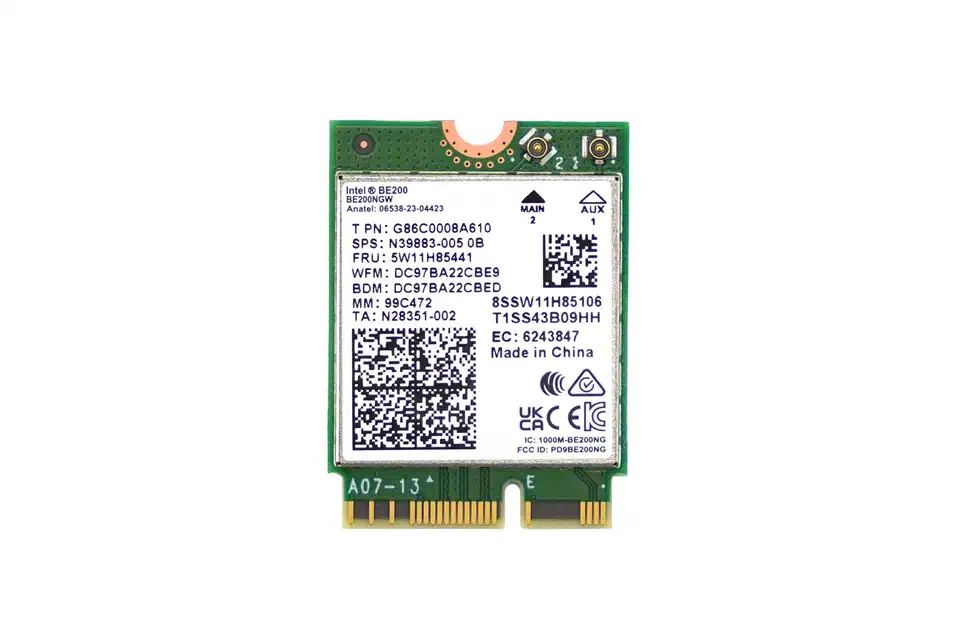 Intel BE200NGW M.2 WiFi 7 card close-up showing the green PCB with main and aux antenna connectors labeled