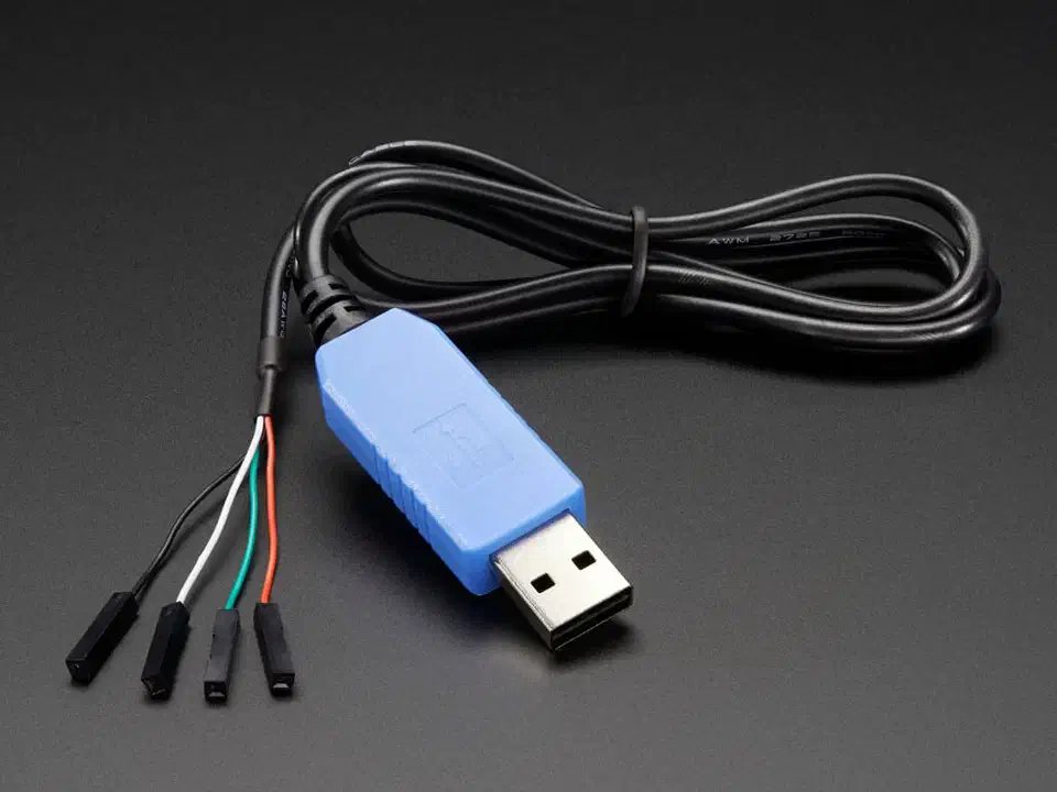 USB to TTL serial cable with a USB type A plug and four coloured jumper wire connectors for ground, power, RX and TX