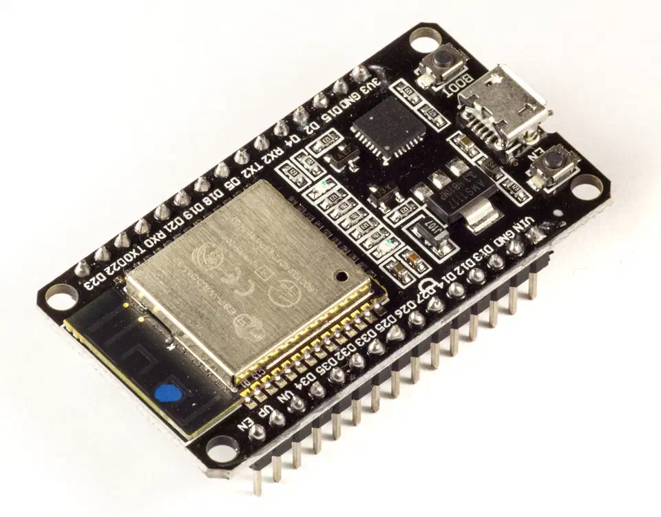 ESP32 ESP-WROOM-32 development board on a white background with the shielded module, USB connector, and pin headers visible
