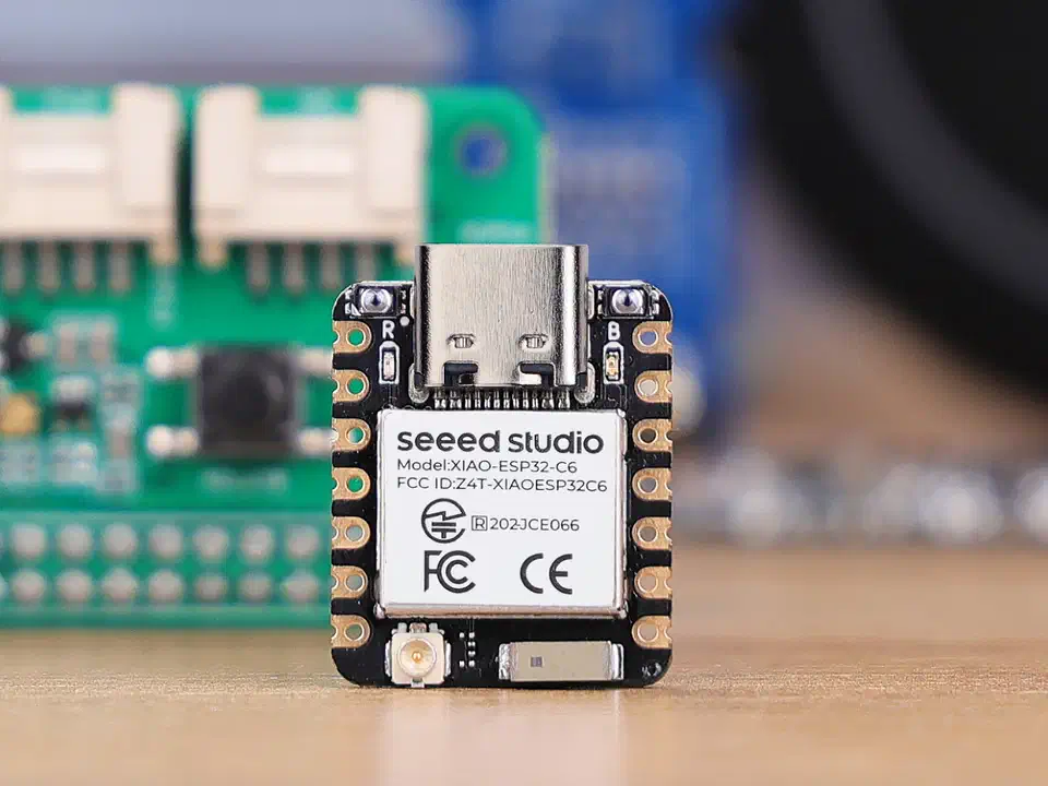 Seeed XIAO ESP32-C6 development board showing its compact thumb-sized form factor with castellated pads